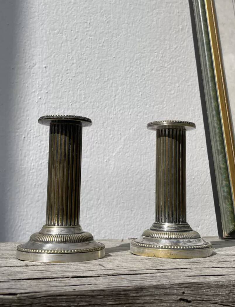 Pair of 19th-century fluted silver-plated metal candlesticks