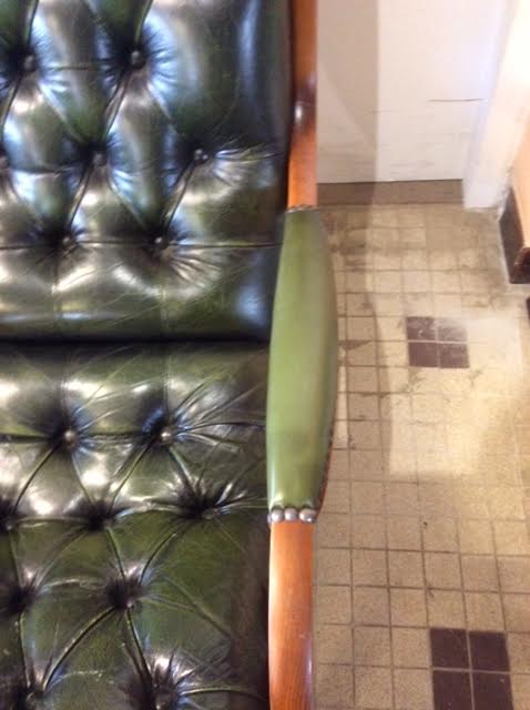 Green Chesterfield armchair