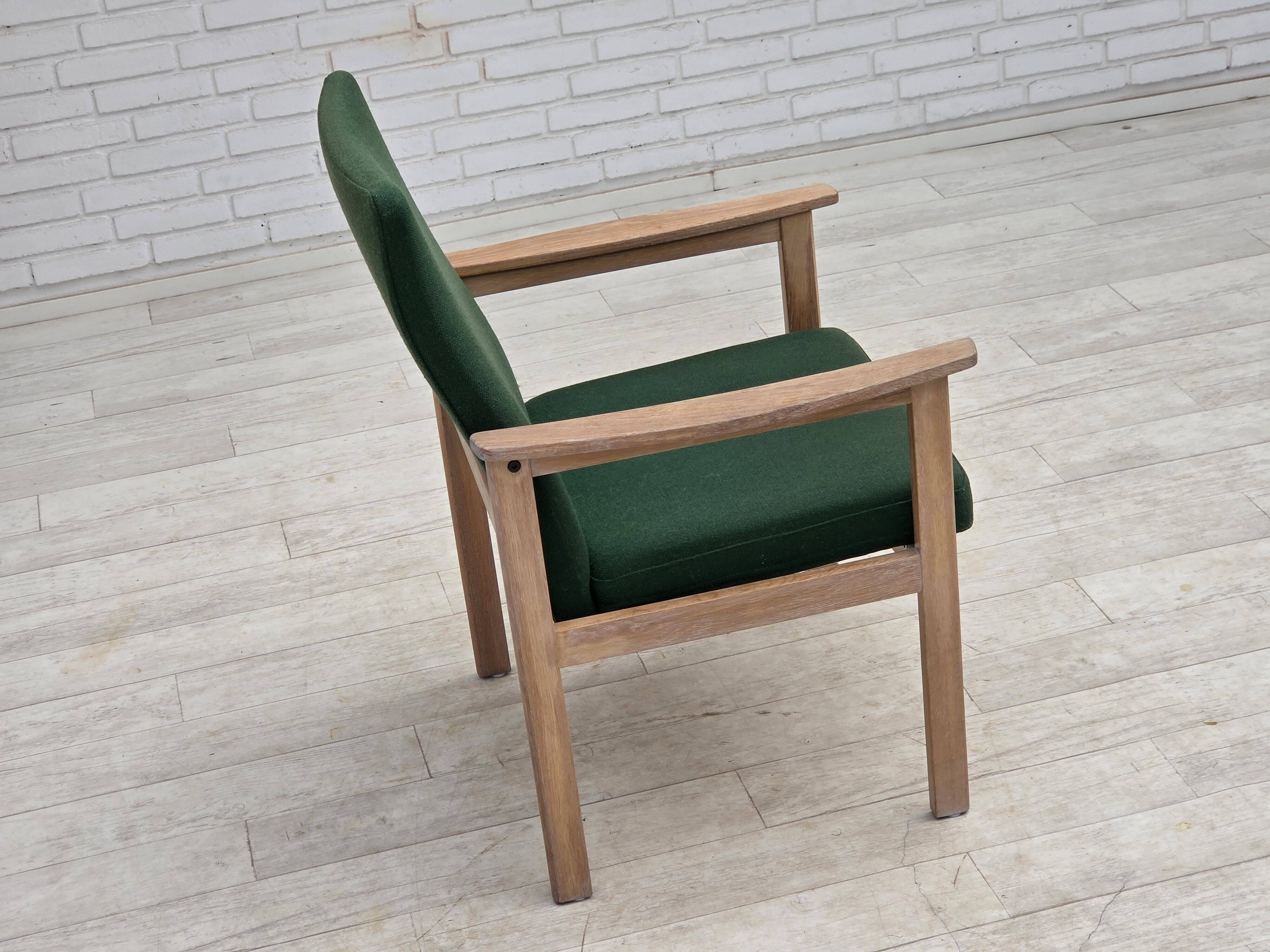 1980s, Danish armchair by Høng Stole, green furniture wool, oak wood.