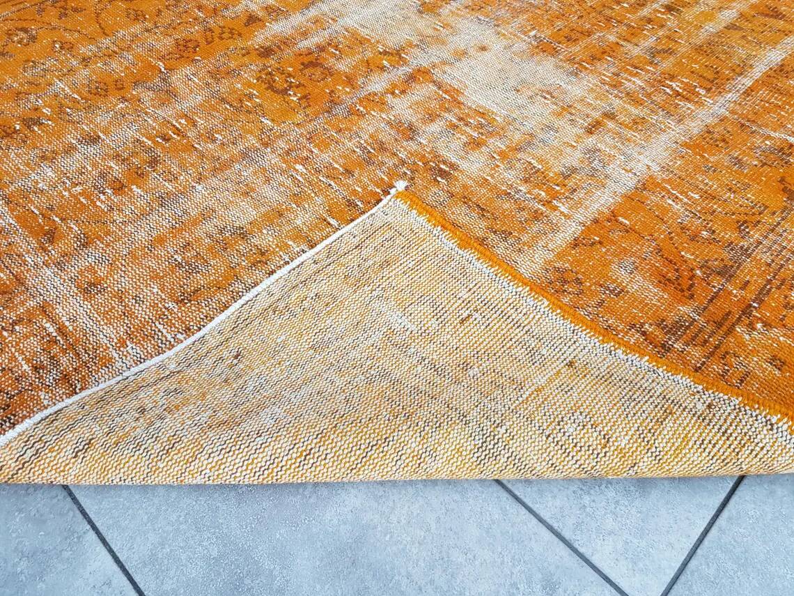 Tapis vintage orange surteint