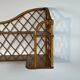 Corner wall shelf in rattan attributed to Audoux-Minet.