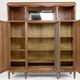 Art Deco showcase bookcase in carved walnut, France, circa 1925