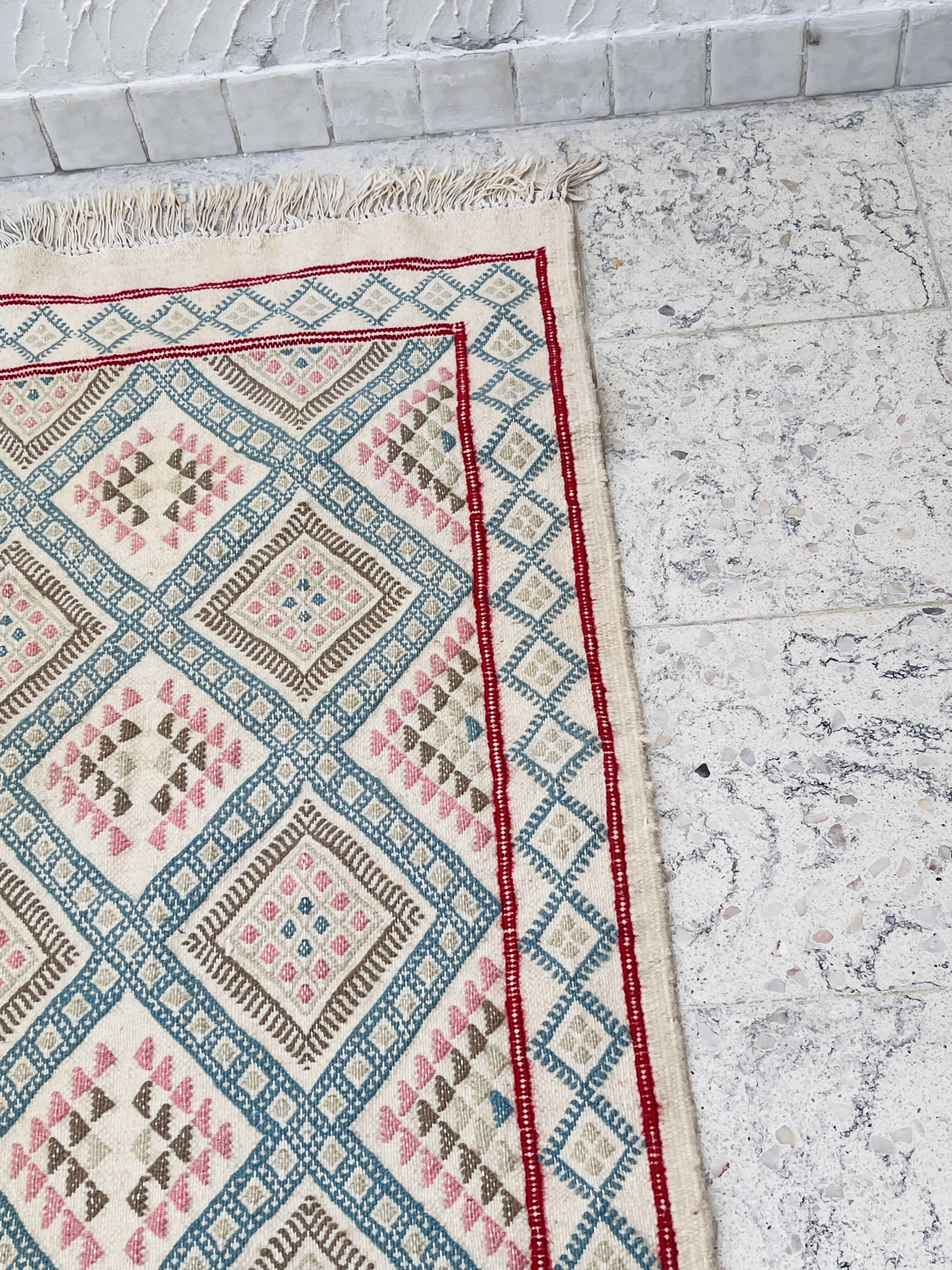 Handmade vintage Tunisian rug