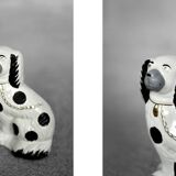 Vintage ceramic figurine from Staffordshire depicting a spaniel dog, England.