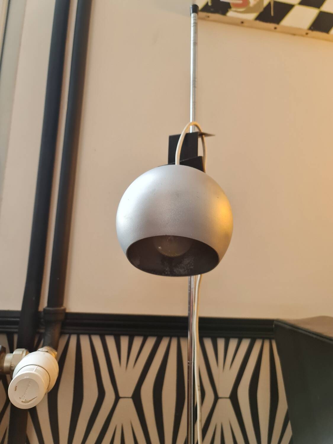 Two-light floor lamp with removable magnetic Eyes Ball.