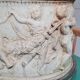 Round white stone pot cover with a farandole of angels