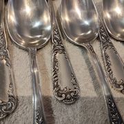 12 silver-plated metal dessert spoons, silversmith SFAM, rocaille design, 19.1 cm.