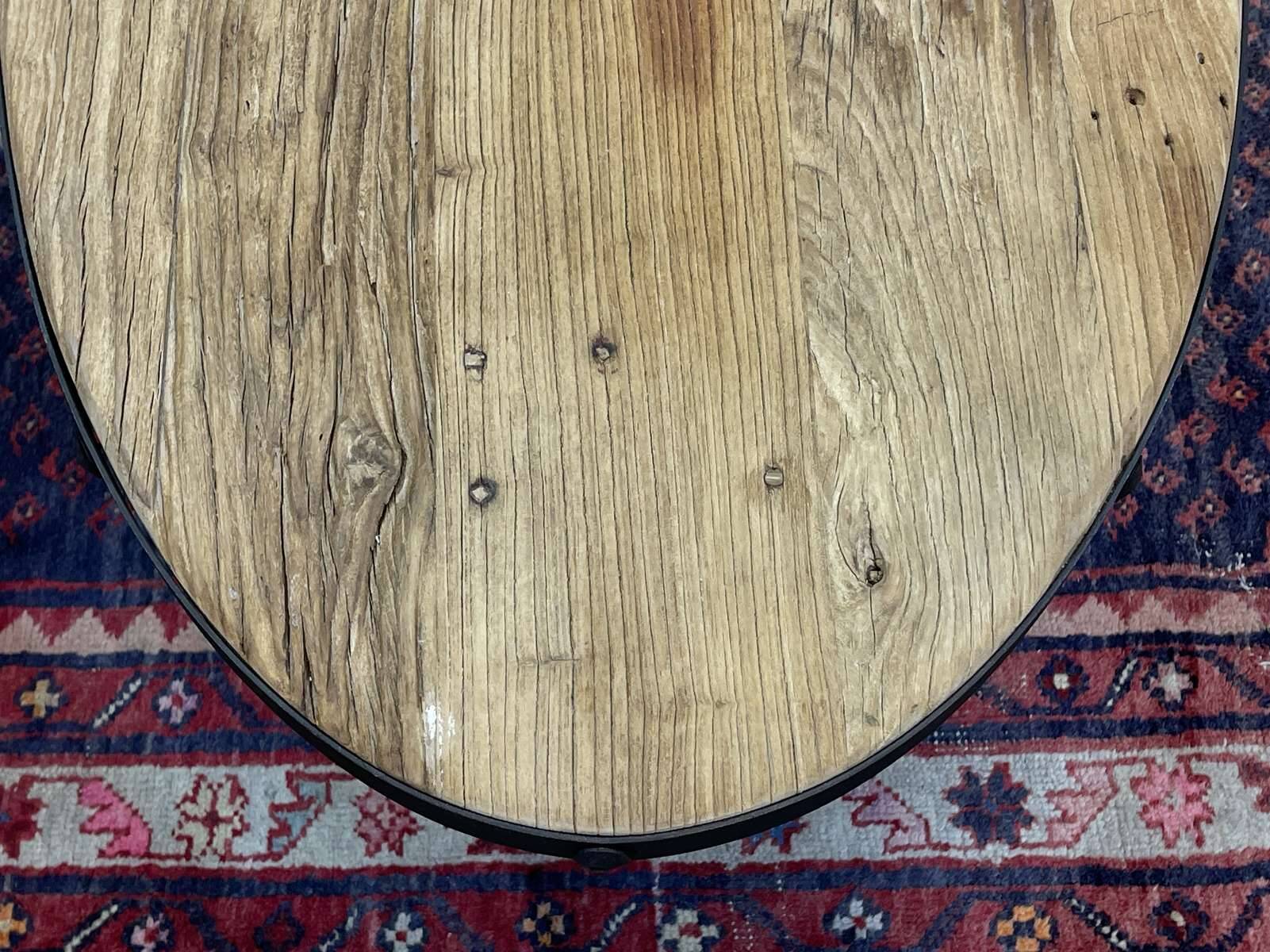 Oval coffee table in oak with steel base
