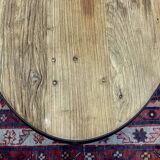 Oval coffee table in oak with steel base