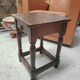 Small stool, side table or bedside table in solid wood with turned legs.
