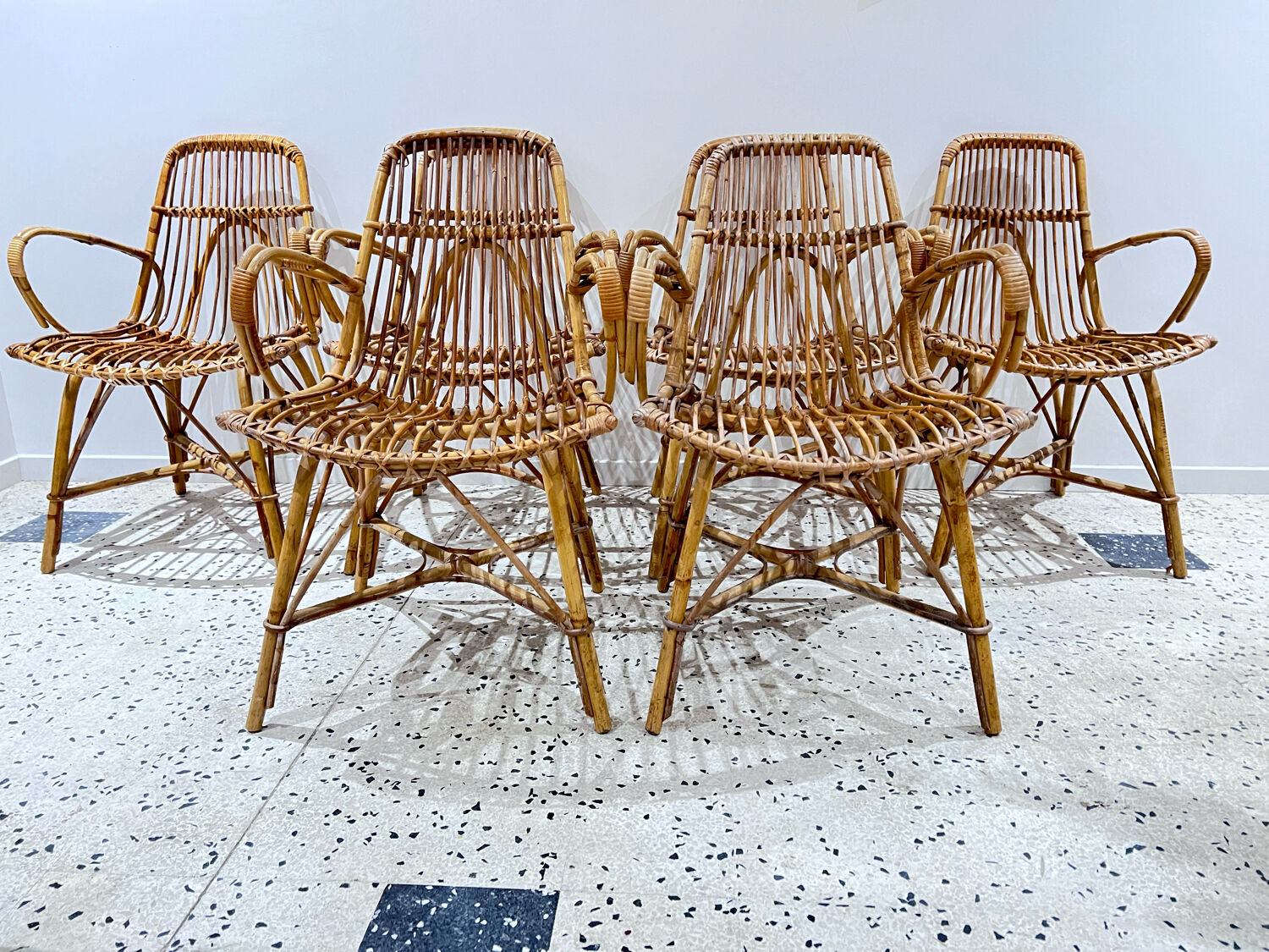 Six vintage rattan chairs