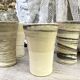 High ceramic cups made of mixed clay.
