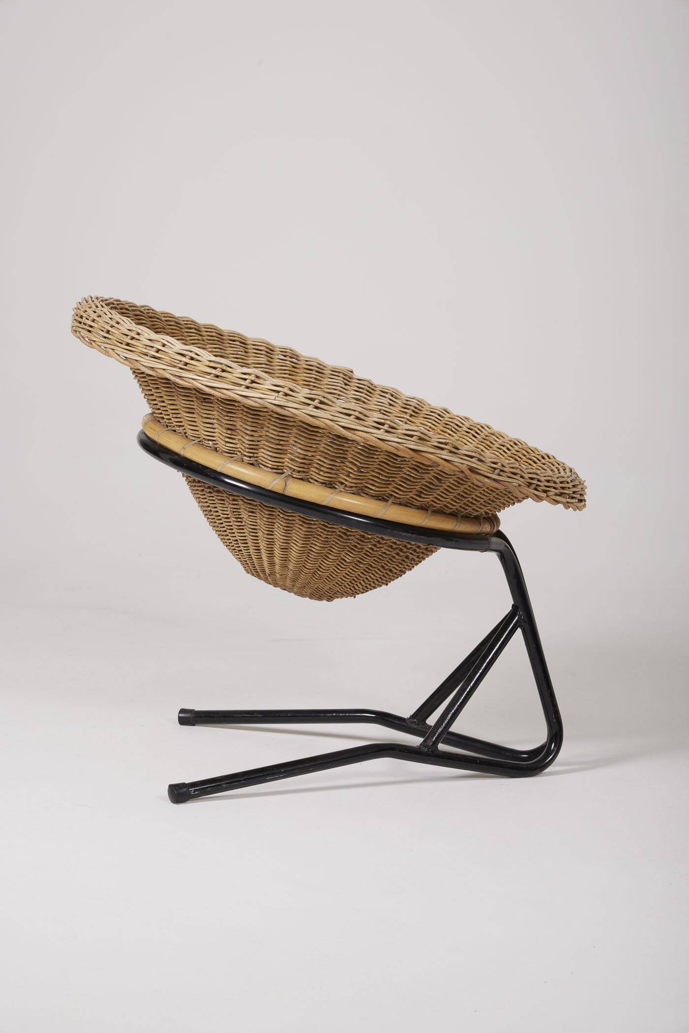 Arnold Bueno rattan and metal armchair by Mesquita