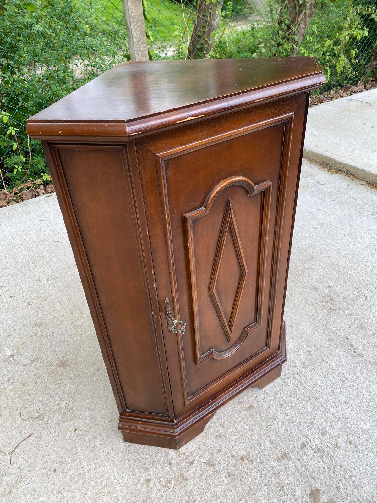 Colonial-style wooden corner entryway chest