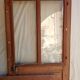 Old glazed door with its shutter