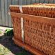 Antique wicker travel trunk