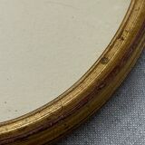 Old oval shaped wooden frame