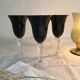 6 stemmed glasses with black glass bowl