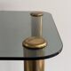 Side table in thick greenish glass with brass legs, Italy, 1960s.