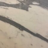 Oval marble dining table with iron base