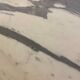 Oval marble dining table with iron base