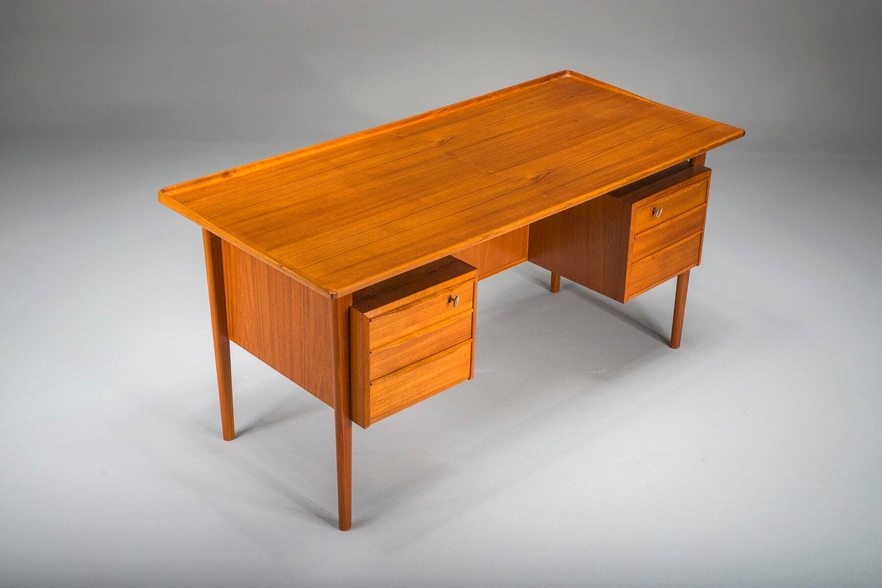 Danish teak desk by Peter Lovig Nielsen for Hedensted Mobelfabrik, 1974