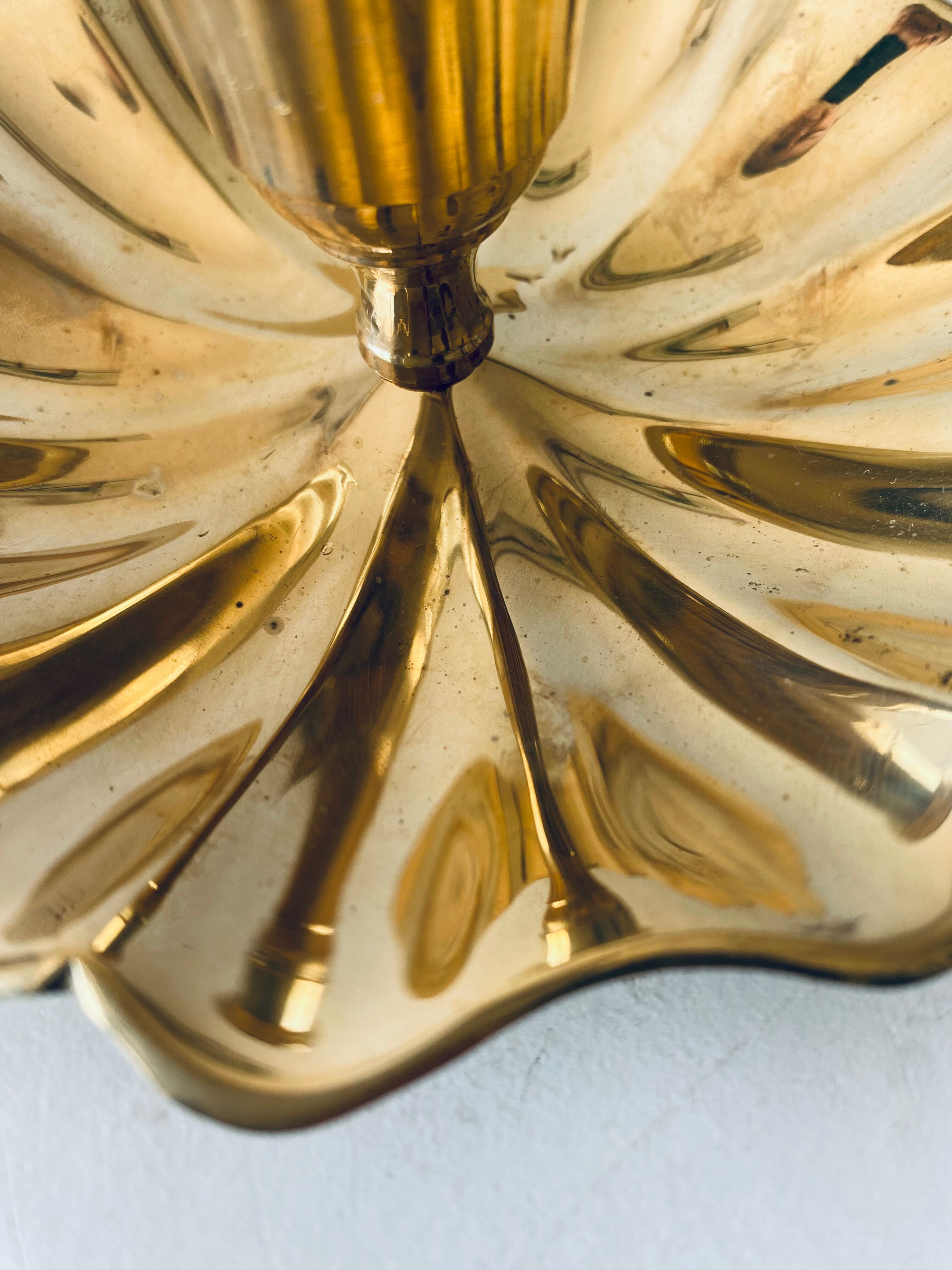 Indian candle holder in golden brass