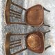 Pair of brasserie bistro chairs with seashell on seat