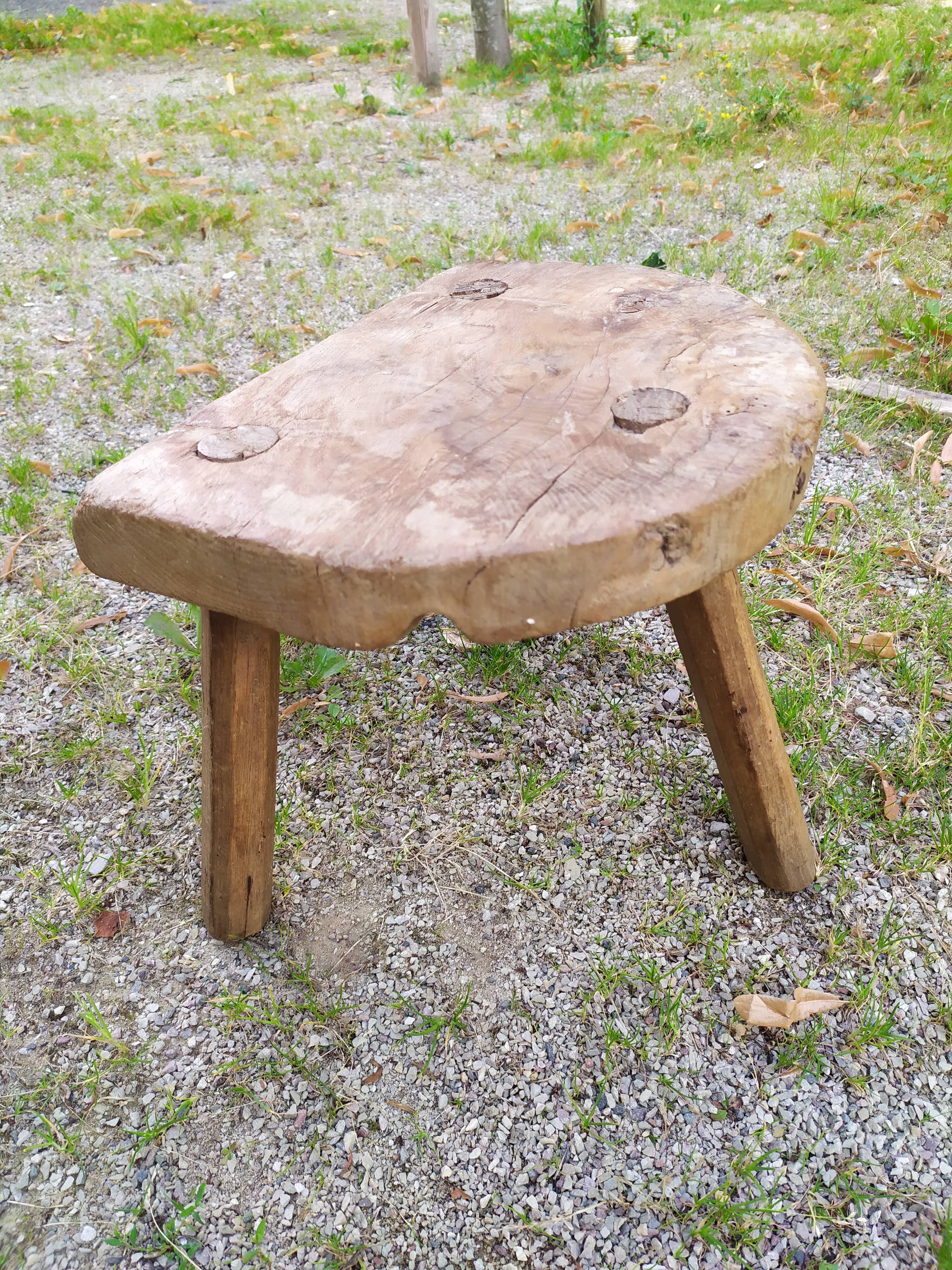 Tripod stool in raw wood