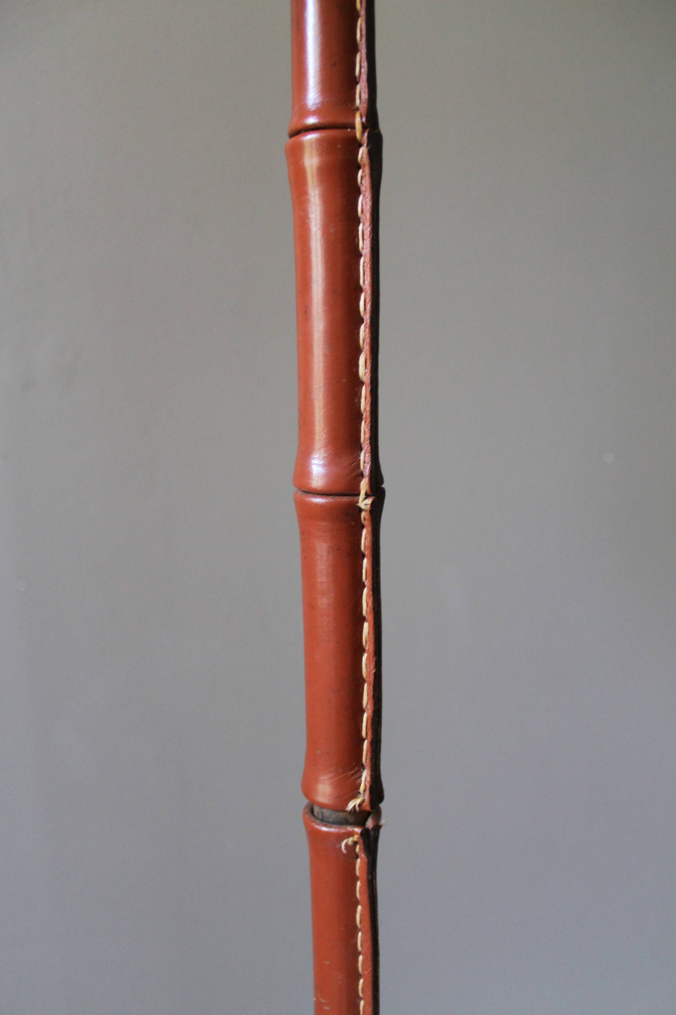 Vintage floor lamp with bamboo-style leather base