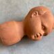 Vintage terracotta kids head vase
