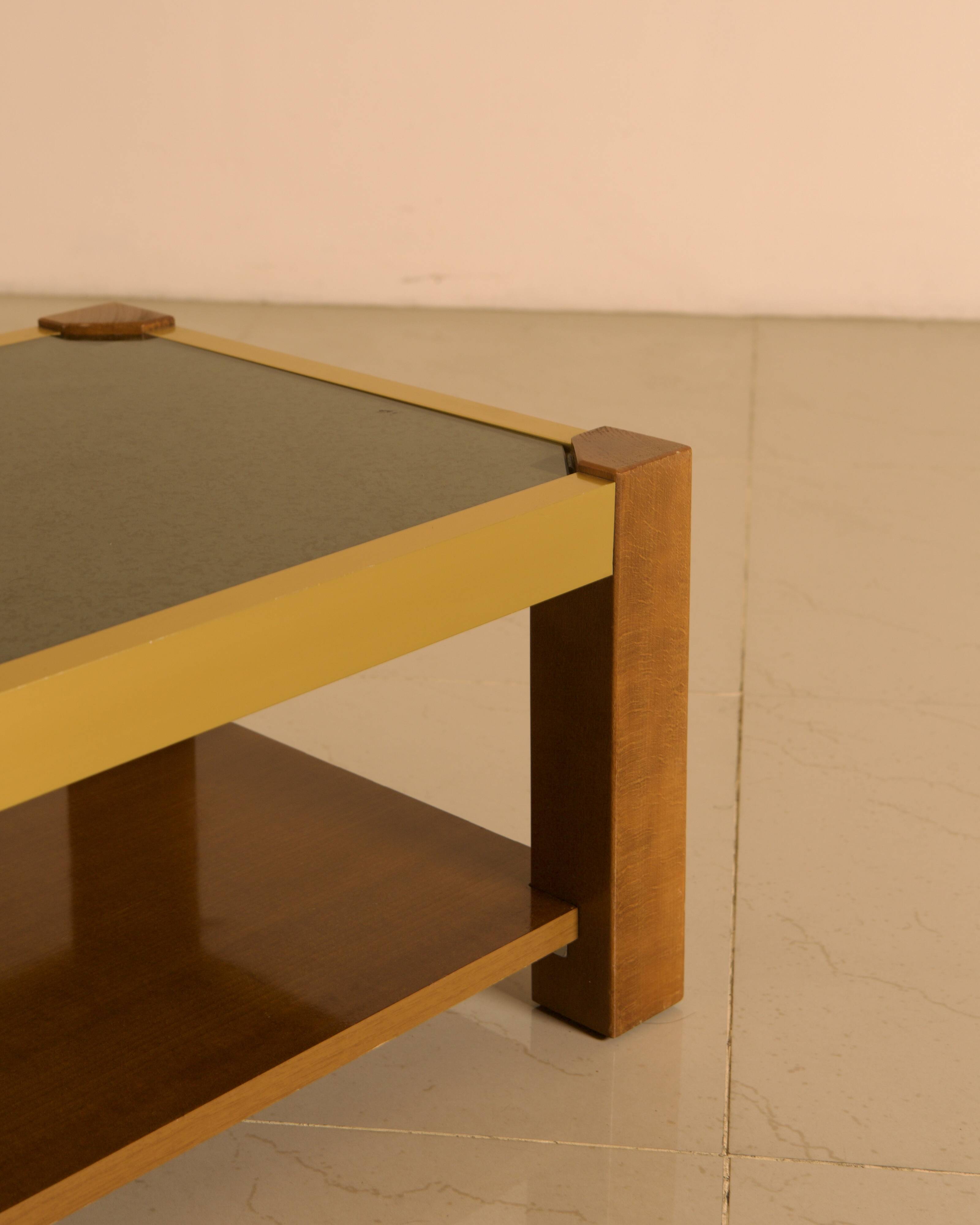 Rectangular Italian coffee table in wood and gold metal from the 70s.