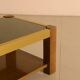 Rectangular Italian coffee table in wood and gold metal from the 70s.