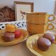 Duo of chocolate cups, breakfast, Bistro style, porcelain, yellow and gold