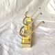 Vintage gold aluminum coat rack with three hooks