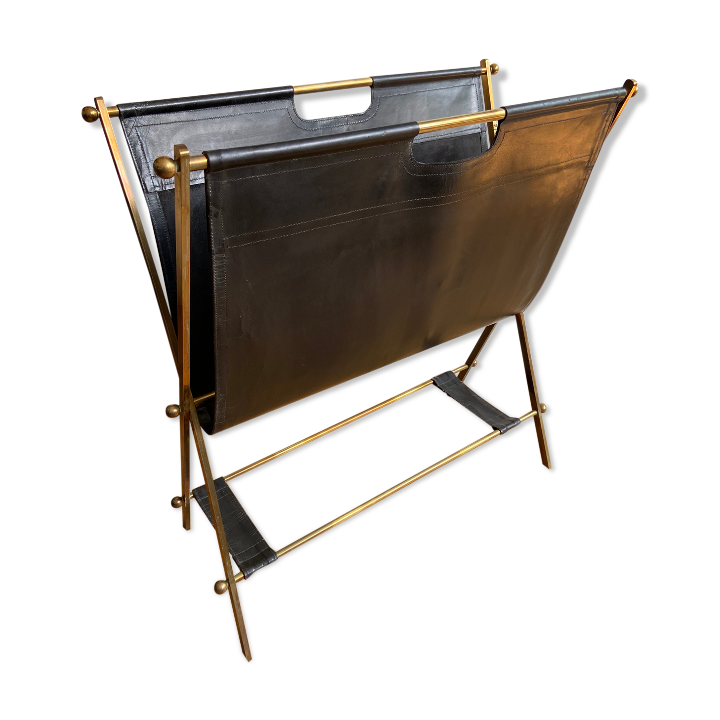 Leather and gilded brass magazine holder