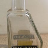 Ricard glass decanter white logo blue cartridge yellow background