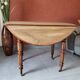 Old round table in walnut with flaps Louis Philippe