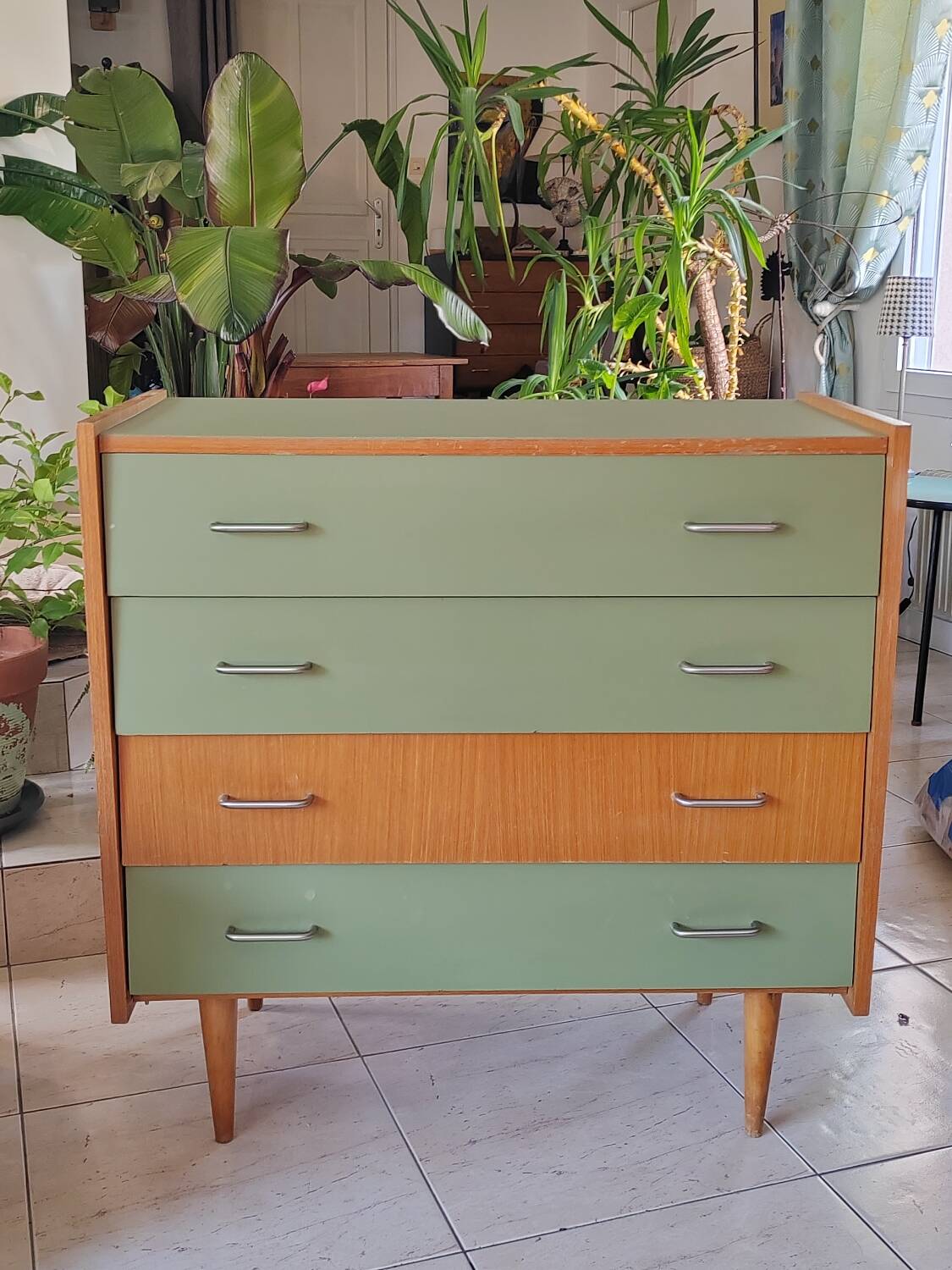 Vintage commode refurbished with tapered legs.