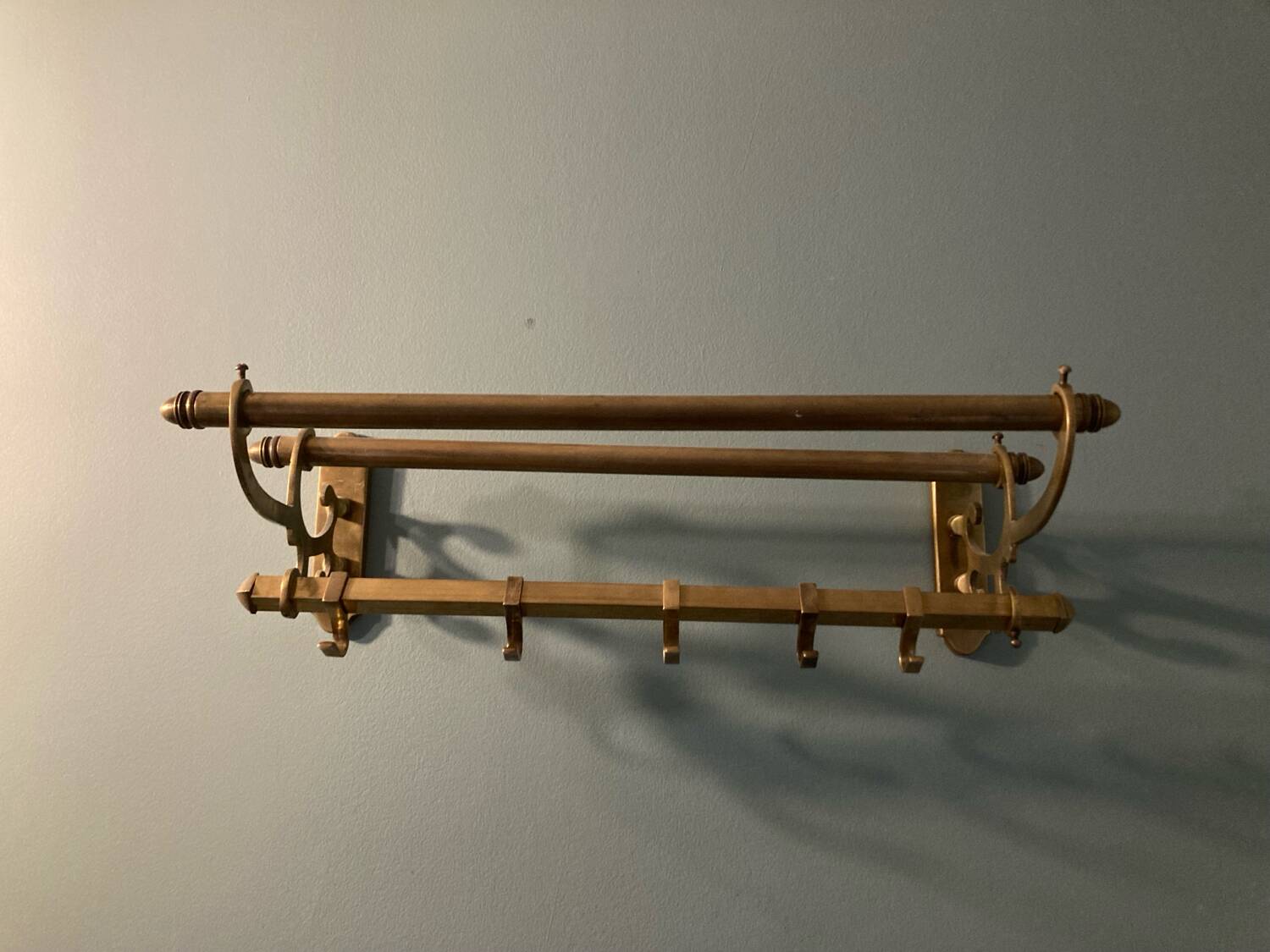 Antique brass coat rack and wall-mounted hat holder