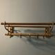 Antique brass coat rack and wall-mounted hat holder