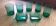 Set of 5 glasses and 2 green ramekins for appetizers.