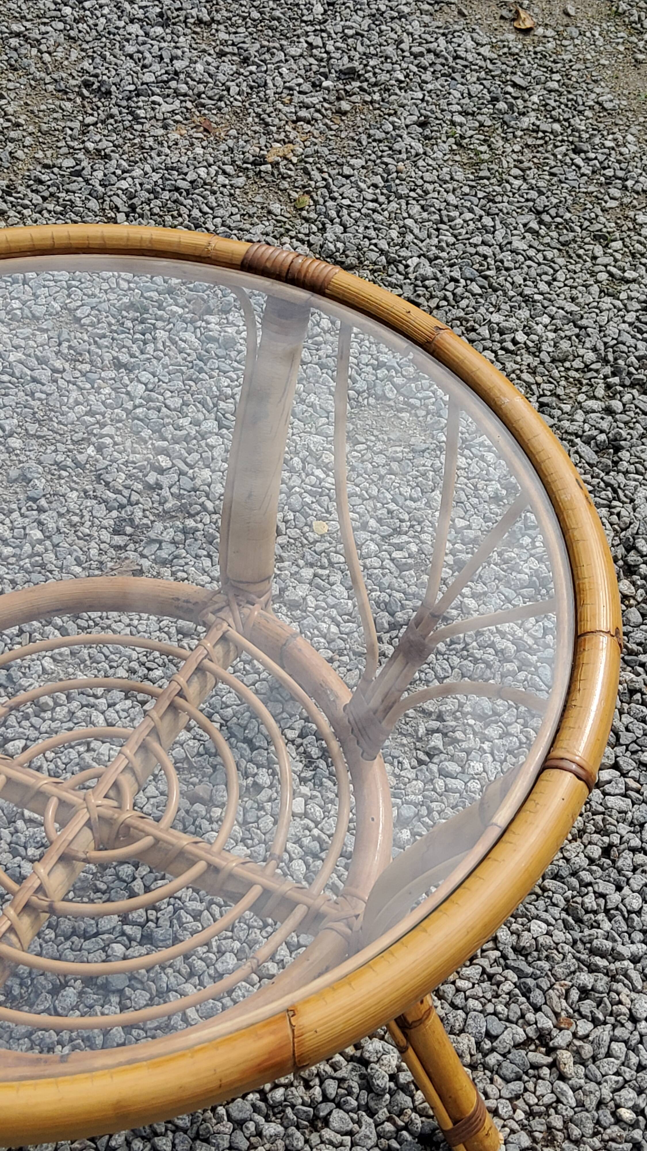 Round rattan coffee table with glass top from the 70s