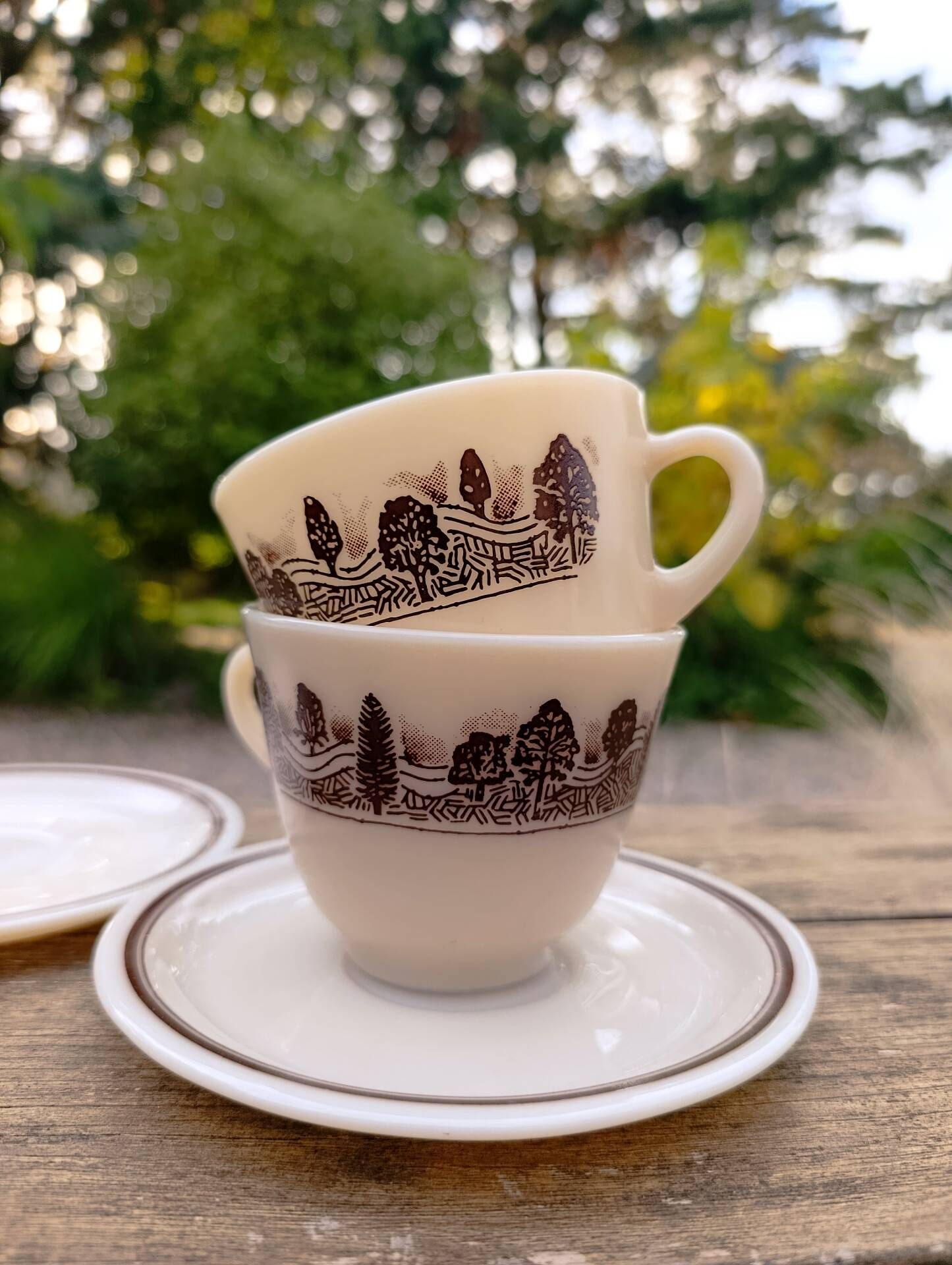 Two vintage opaline glass cups/saucers JAJ Pyrex England.