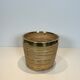 Rattan and brass wastepaper basket in the style of Gabriela Crespi.