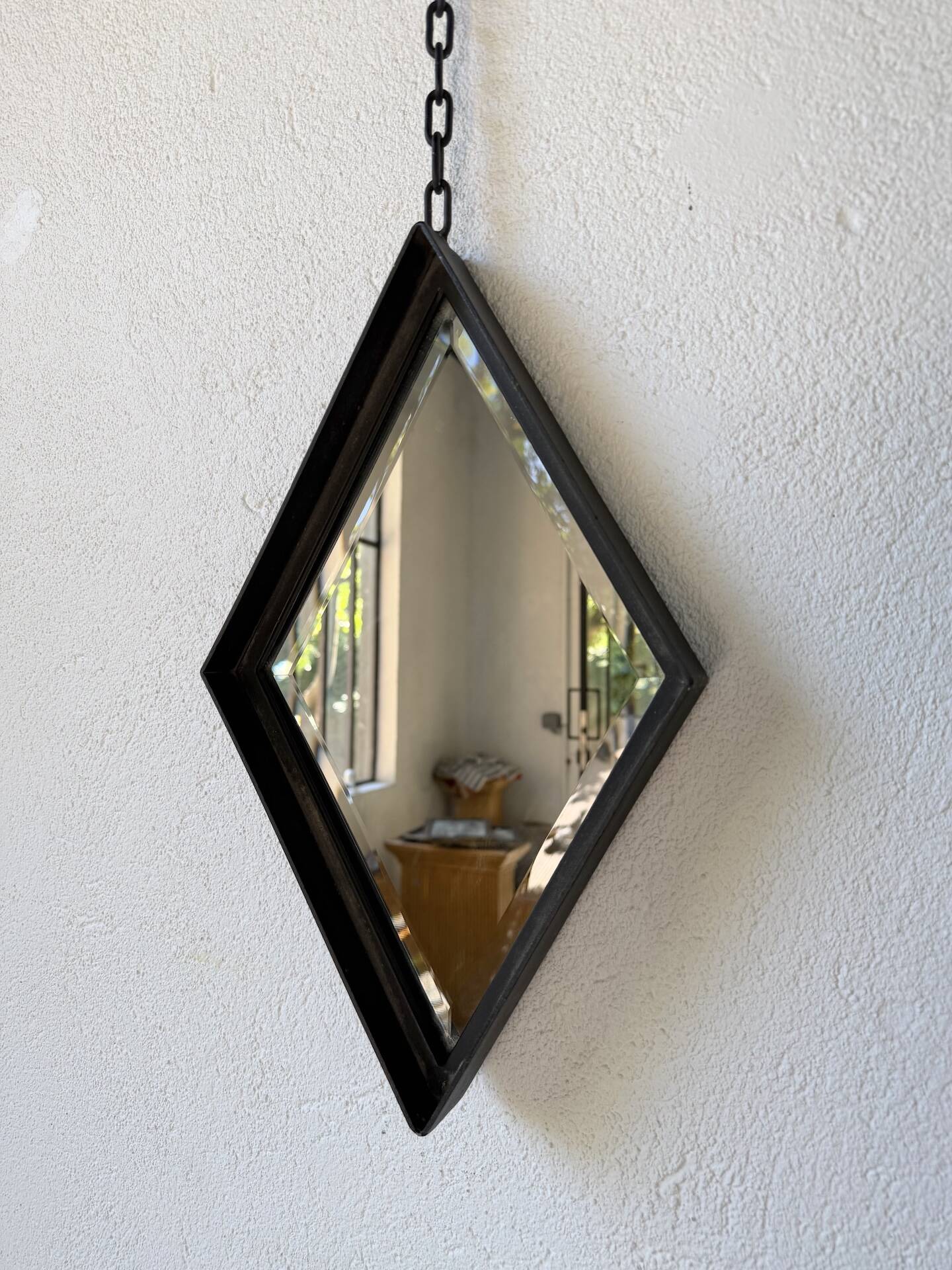 Miroir brutaliste losange en fer