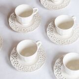 6 antique cups in openwork lace earthenware