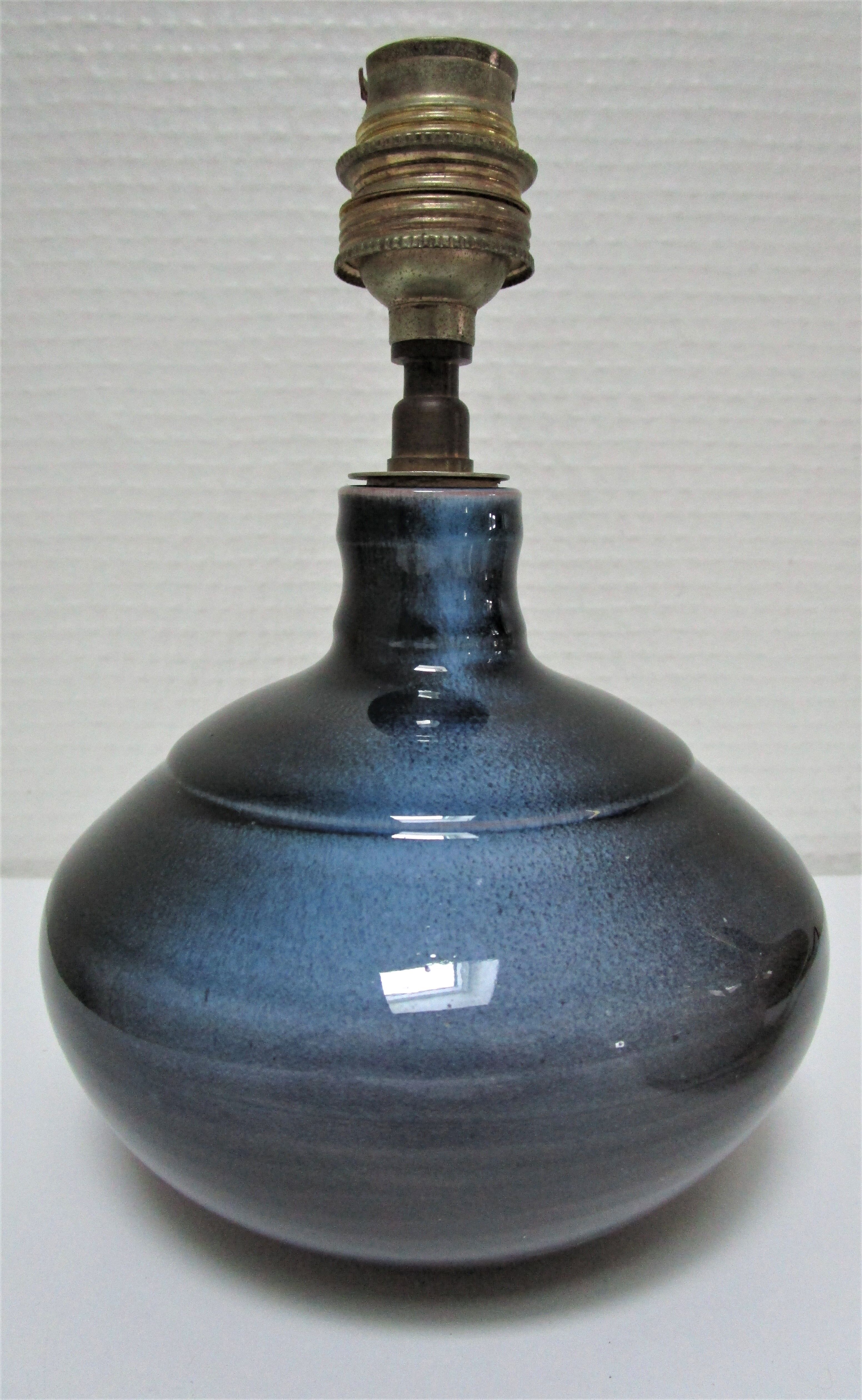 Three vintage ceramic lamps in blue, white and suede