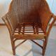 Set of 2 armchairs in adult varnished woven rattan