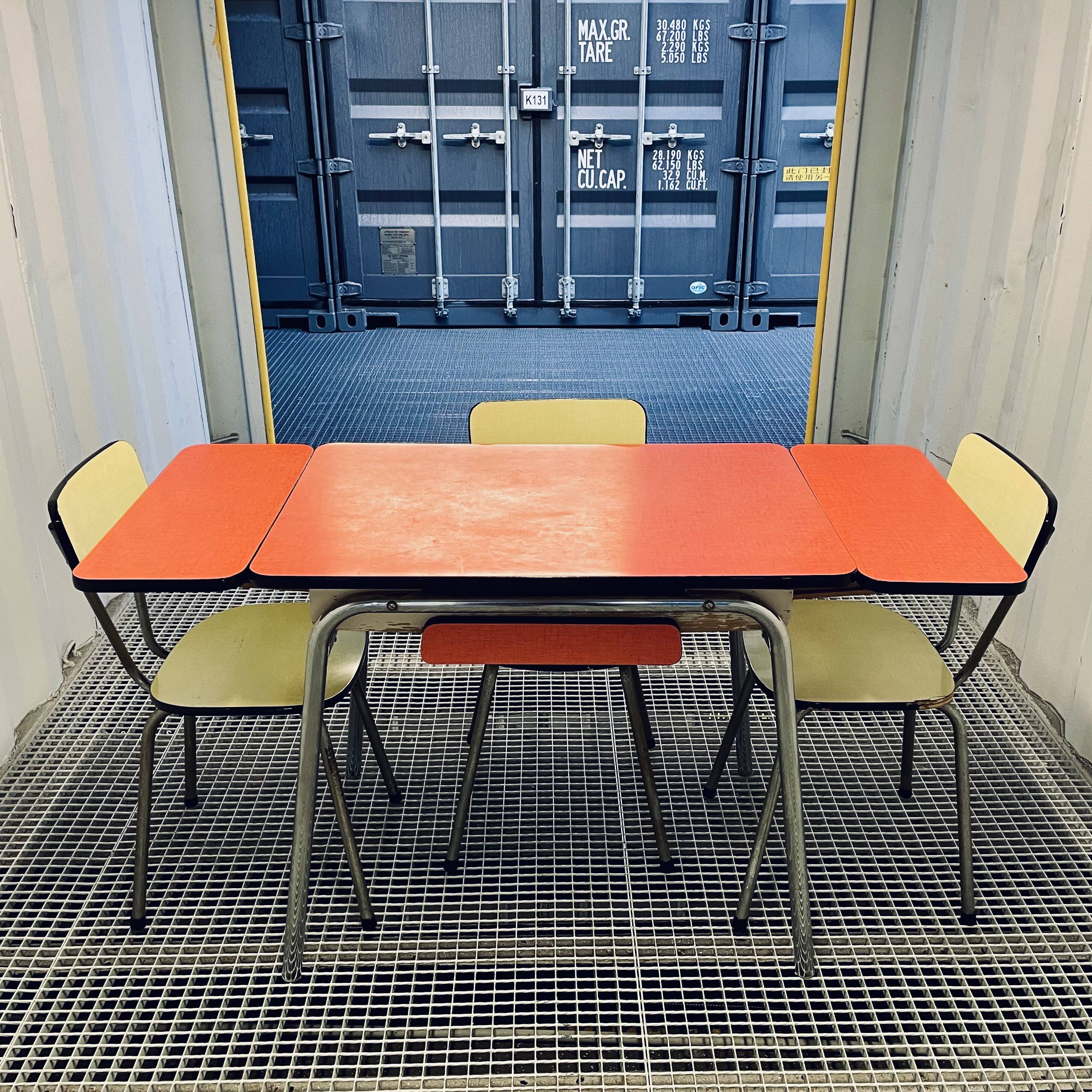 Red Formica table and vintage yellow chairs